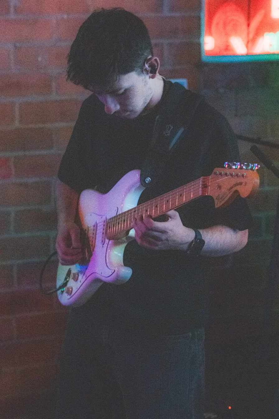 Guitarrista y Director de la banda
